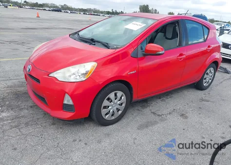 2014 Toyota Prius C One z USA, uszkodzony, nr VIN JTDKDTB36E1083182